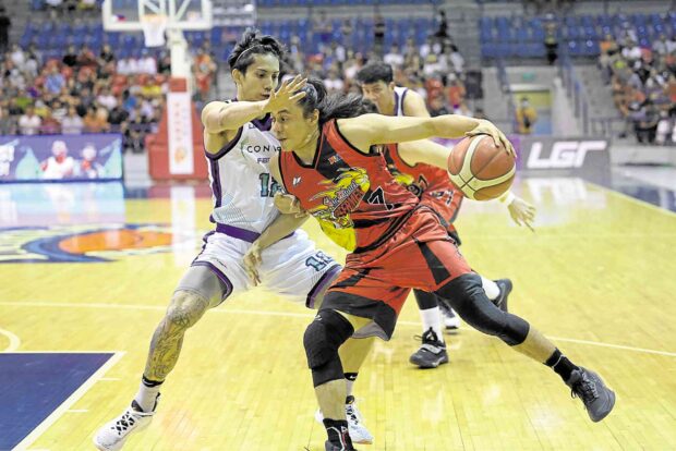 Terrence Romeo (right) in action vs Converge. —PBA IMAGES      