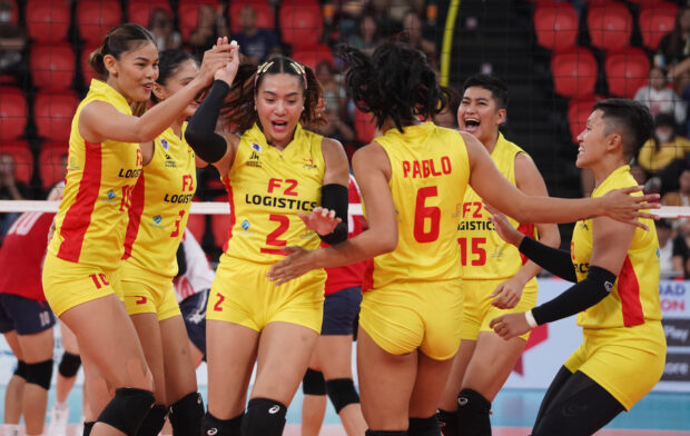 The veteran Aby Maraño (No. 2) leads the F2 celebration on the floor after a tight win over KinhBac-Bac Ninh of Vietnam. —AUGUST DELA CRUZ