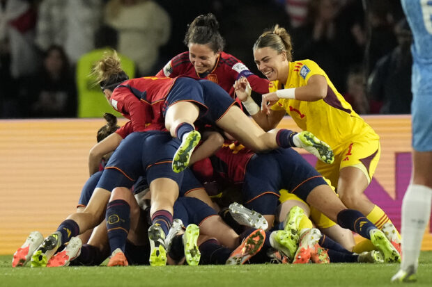 Spain’s team players celebrate as they won the final of Women’s World Cup soccer between Spain and England at Stadium Australia in Sydney, Australia, Sunday, Aug. 20, 2023. 