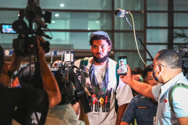 Karl-Anthony Towns goes through the media gauntlet upon arrival. —MIAA PHOTO