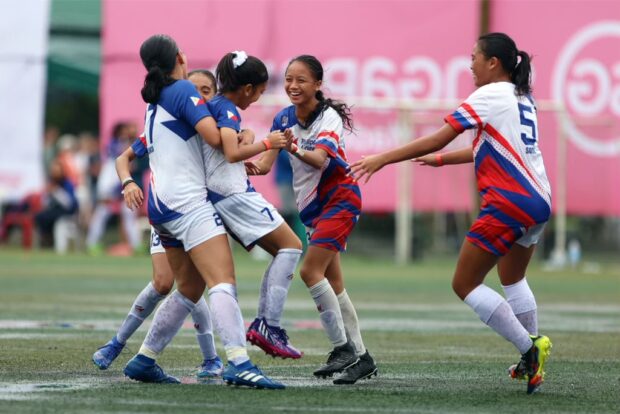 A group of teenage girls from Makati Football Club celebrate after a victory in an international tournament. There is a lot of talent in age-group football nowadays and new Filipinas coach Mark Torcaso hopes to be able to develop them for the national pool. —CONTRIBUTED PHOTO