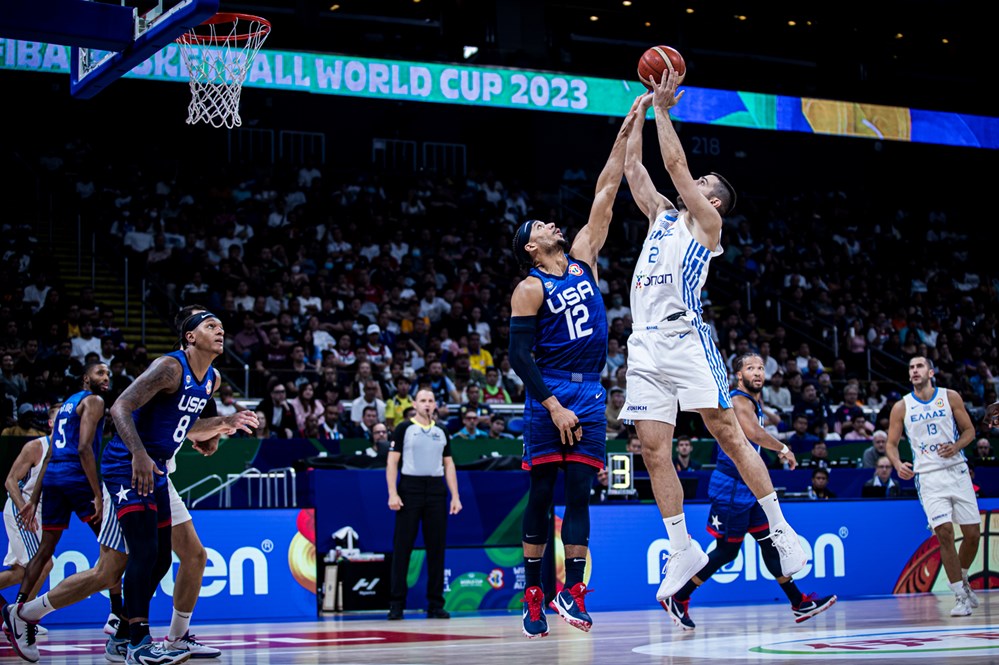 Team USA's Josh Hart  against Greece's Ioannis Papapetrou in a Fiba World Cup game.