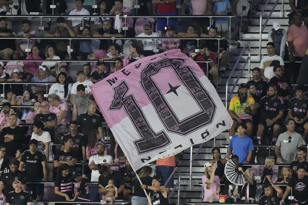Soccer fans wave a large flag for Inter Miami forward Lionel Messi (10) during the first half of an MLS soccer match against Sporting Kansas City, Saturday, Sept. 9, 2023, i
