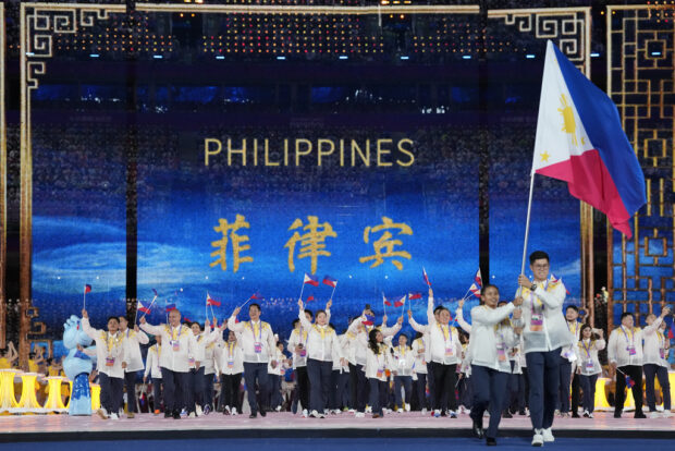 Philippines' athletes and team officials arrive during the opening ceremony of the 19th Asian Games in Hangzhou, China, Saturday, Sept. 23, 2023. 