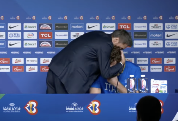 Italy Gianmarco Pozzecco hugs Niccolo Melli in the post-game press conference after their loss to United States in the Fiba World Cup. 