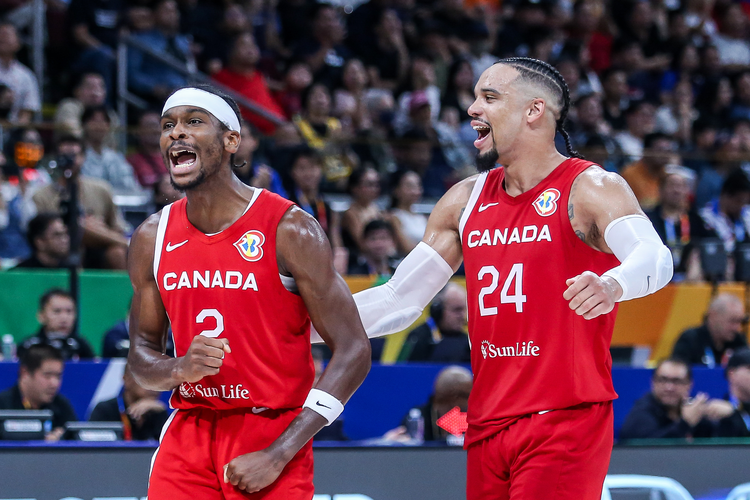 Canada’s Shai Gilgeous-Alexander (left) with Dillon Brooks in the Fiba World Cup bronze medal game against Team USA.