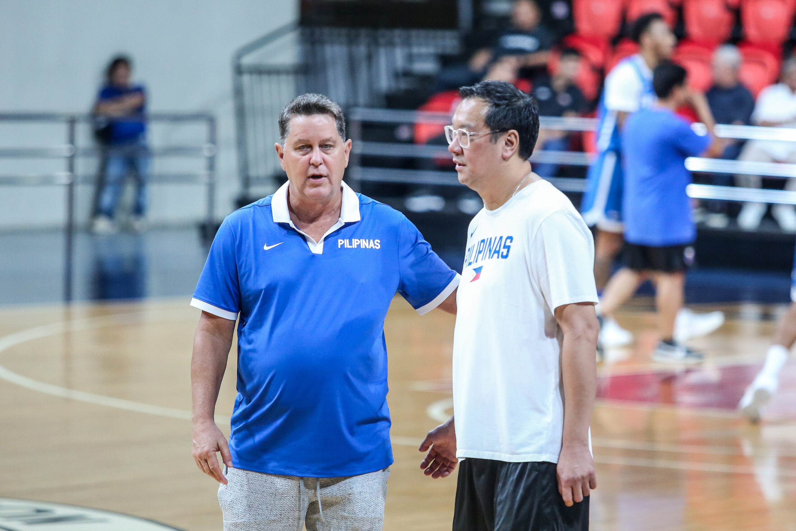 Gilas Pilipinas coaches Tim Cone and Pat Aquino.