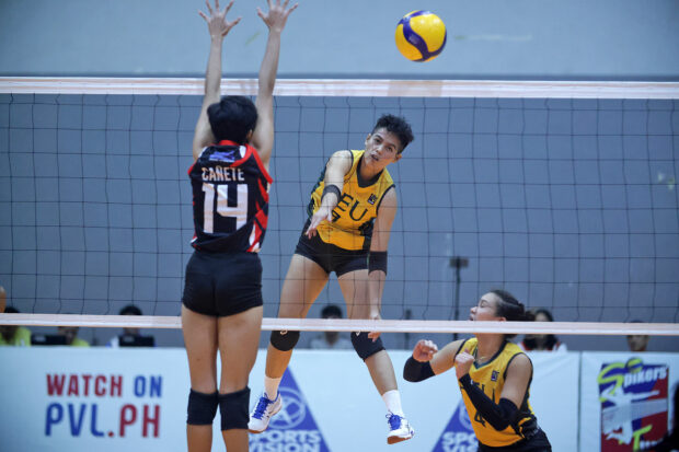 Chenie Tagaod (right) hammers a point for FEU. —PVL PHOTO