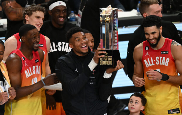 Milwaukee Bucks' Giannis Antetokounmpo lift the trophy after his team won the NBA All-Star game between Team Giannis and Team LeBron at the Vivint arena in Salt Lake City, Utah, February 19, 2023.