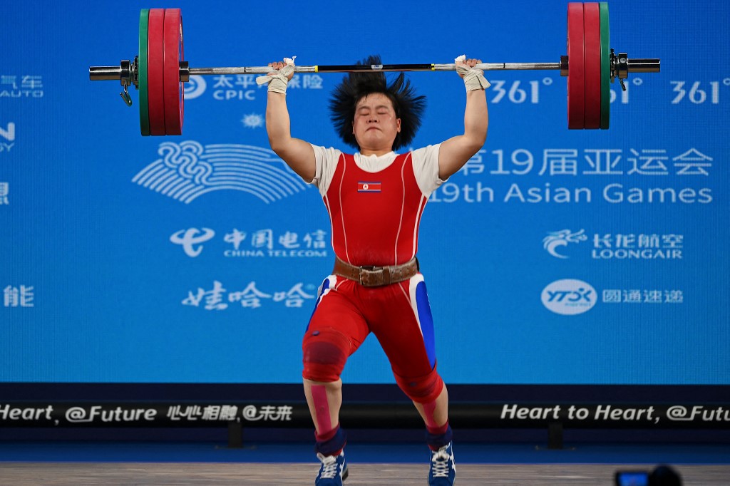 North Korea's Song Kukhyang competes in the women's 76kg group A weightlifting competition during the 2022 Asian Games in Hangzhou,