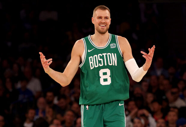 Kristaps Porzingis #8 of the Boston Celtics celebrates his three point shot in the first quarter against the New York Knicks at Madison Square Garden