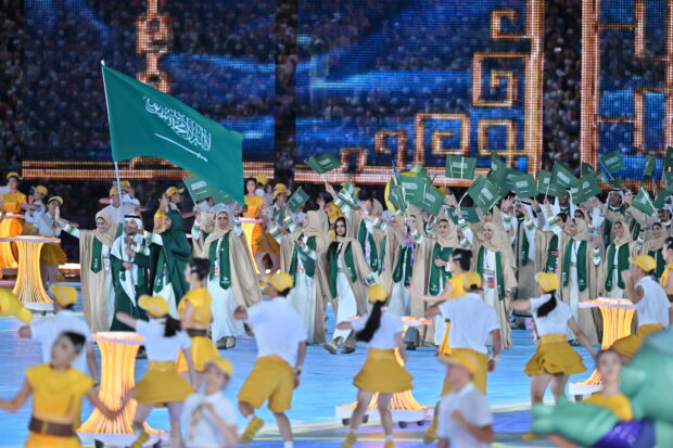 Members of Team Saudi Arabia take part in the athletes parade during the opening ceremony of the 19th Asian Games at the Hangzhou Olympic Sports Centre Stadium on September 23, 2023 in Hangzhou, Zhejiang Province of China