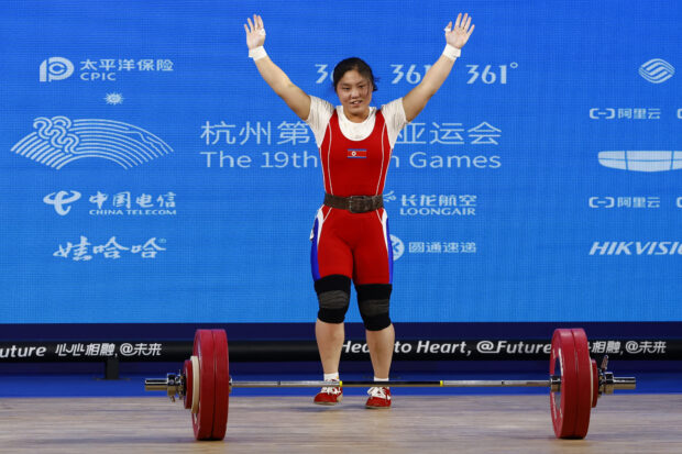 - Hangzhou 2022 - Weightlifting - Xiaoshan Sports Centre Gymnasium, Hangzhou, China - October 2, 2023 North Korea's Kim Ilgyong in action during the Women's 59Kg 
