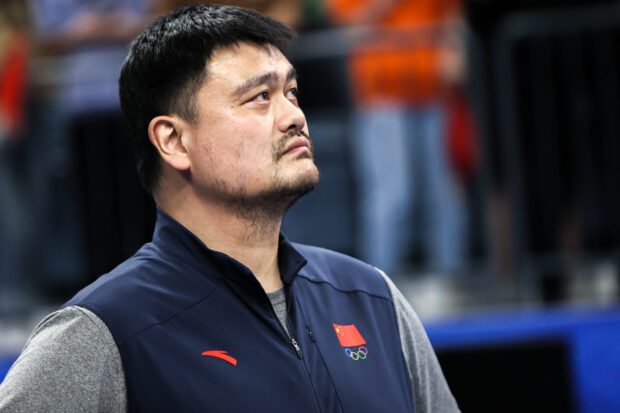 Yao Ming, president of the Chinese Basketball Association, reacts in the Basketball - Men's Semi-final match between Philippines and China on day 11 of the 19th Asian Games at Hangzhou Olympic Sports Centre Gymnasium on October 4, 2023