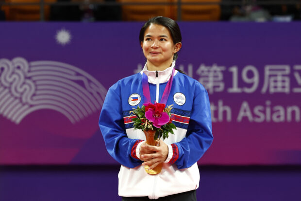 Asian Games - Hangzhou 2022 - Ju-jitsu - Xiaoshan Linpu Gymnasium JJI, Hangzhou, China - October 5, 2023 Gold medalist Philippines' Meggie Ochoa poses during the medal ceremony for the Women's 48Kg 
