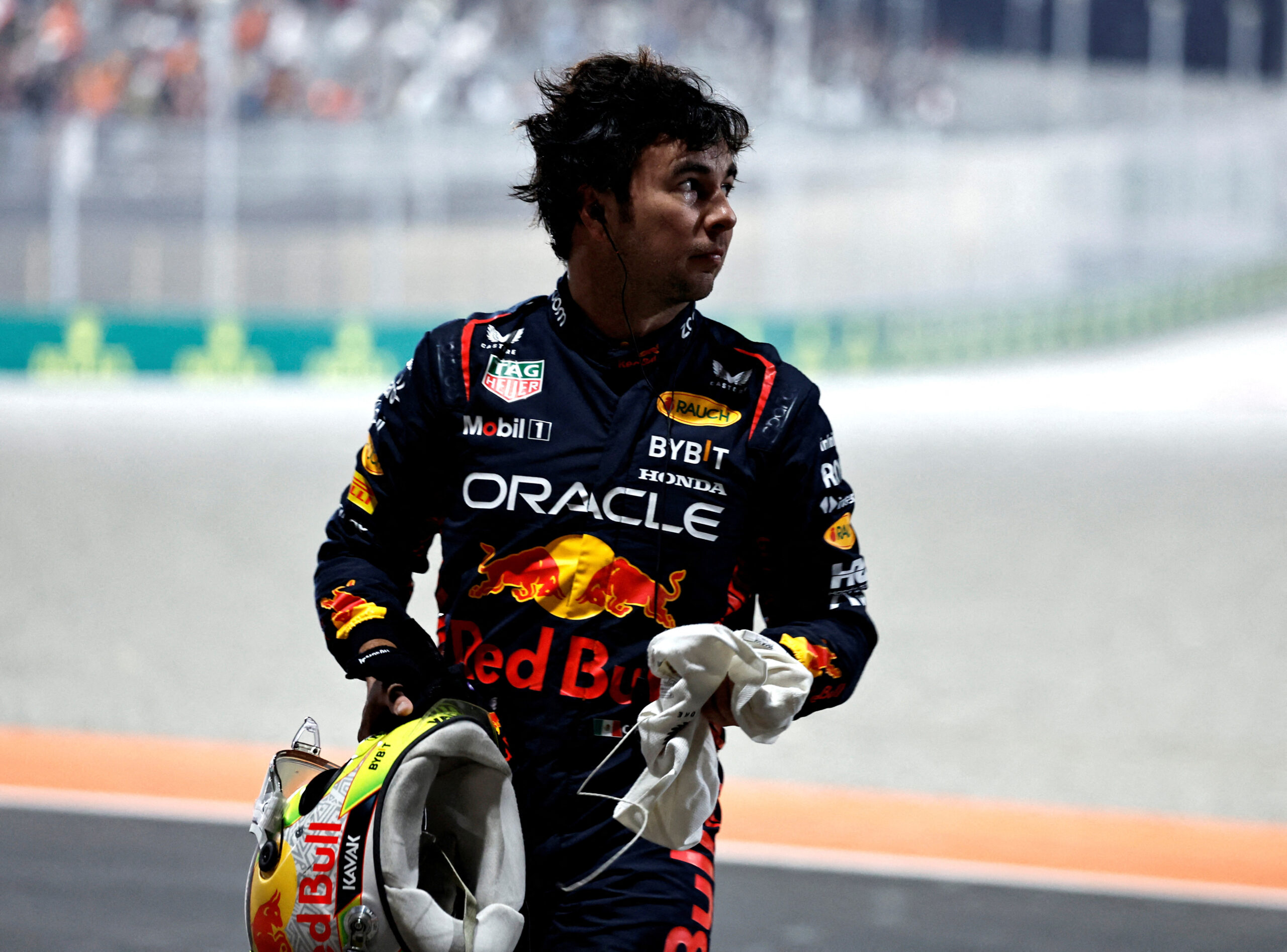F1 Formula Red Bull's Sergio Perez leaves the track after crashing out of the sprint race 