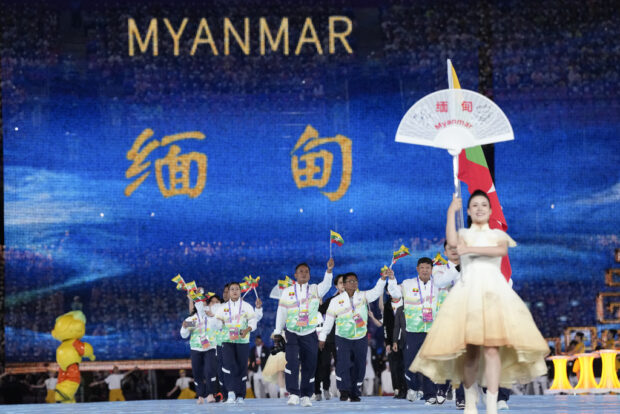 Myanmar's athletes and team officials arrive during the opening ceremony of the 19th Asian Games in Hangzhou, China, Saturday, Sept. 23, 2023. (