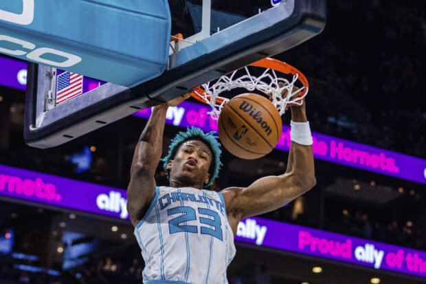 FILE - Charlotte Hornets forward Kai Jones dunks during the first half of an NBA basketball game against the Orlando Magic, March 3, 2023,