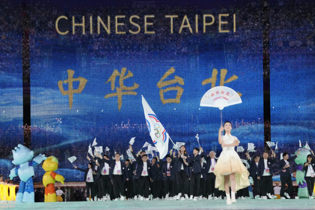 Taiwan's athletes and team officials arrive during the opening ceremony of the 19th Asian Games in Hangzhou, China, Saturday, Sept. 23, 2023. 