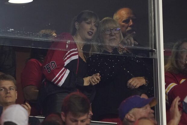 Taylor Swift and Donna Kelce talk during the first half of an NFL football game between the Kansas City Chiefs and the Denver Broncos, Thursday, Oct. 12, 2023, in Kansas City, Mo
