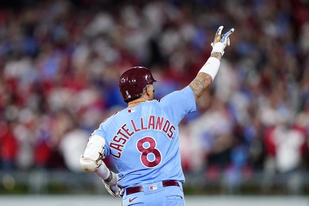 Philadelphia Phillies' Nick Castellanos reacts after hitting a home run during the sixth inning of Game 4 of a baseball NL Division Series against the Atlanta Braves Thursday, Oct. 12, 2023, in Philadelphia.