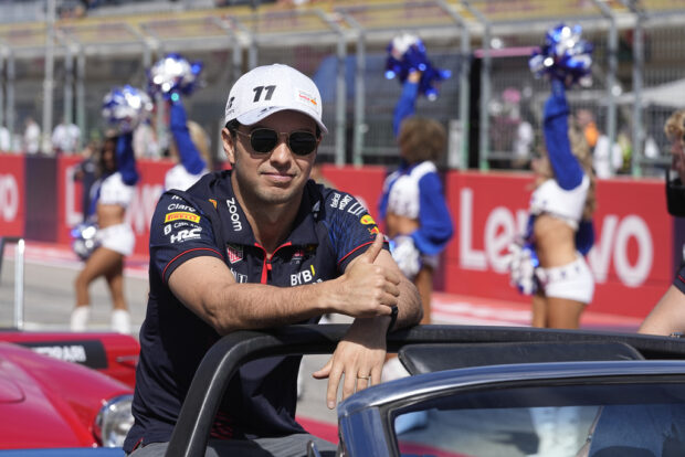 Red Bull driver Sergio Perez, of Mexico, waves during the Formula One U.S. Grand Prix auto race at Circuit of the Americas, Sunday, Oct. 22, 2023, in Austin, Texas. 