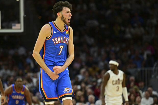 Oklahoma City Thunder forward Chet Holmgren reacts after a 3-point basket in the second half of an NBA basketball game against the Cleveland Cavaliers, Friday, Oct. 27, 2023, in Cleveland.