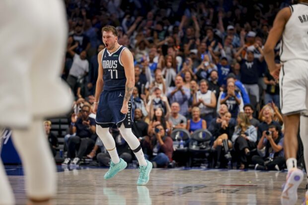 Dallas Mavericks guard Luka Doncic (77) celebrates his 3-pointer against the Brooklyn Nets during the second half of an NBA basketball game Friday, Oct. 27, 2023, in Dallas. 
