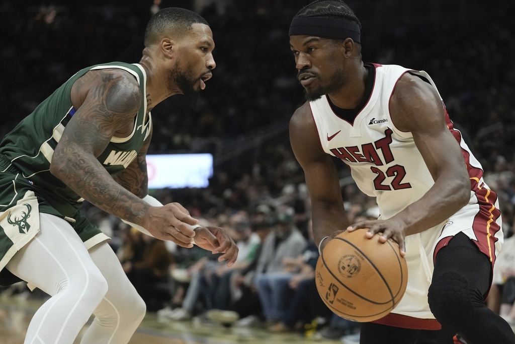 NBA: Giannis Antetokounmpo, Damian Lillard Help Bucks Hold Off Heat ...