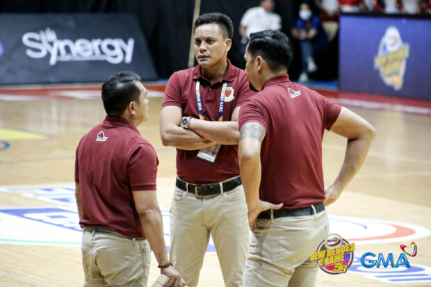 Lyceum coach Gilbert Malabanan talks with his assistant coaches during their game against San Sebastian at San Juan Arena on Tuesday. –NCAA Photo