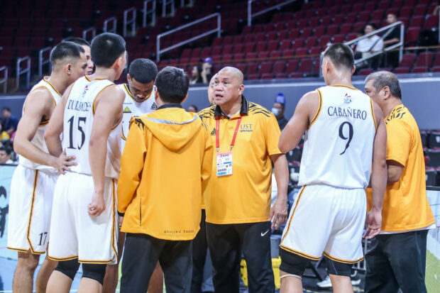 UST coach Pido Jarencio and the Growling Tigers