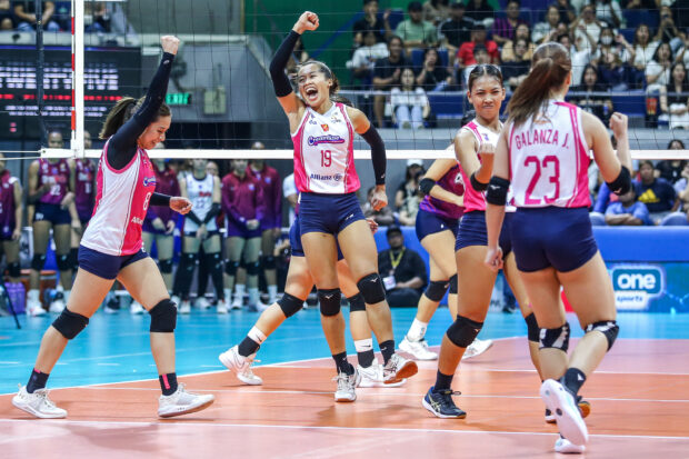 Bernadeth Pons (middle) and the Creamline Cool Smashers celebrate a point against Choco Mucho Flying Titans. 