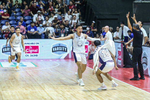 Vince Magbuhos celebrates game winner that lifts Adamson past Ateneo in the UAAP Season 86 men's basketball tournament.