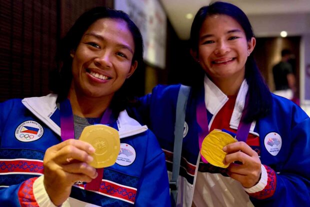 Annie Ramirez (left) and Meggie Ochoa produced half of Team Philippines’ golden haul in the Asian Games. —FRANCIS T. J. OCHOA