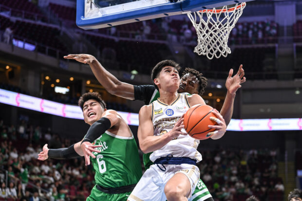 Jake Figueroa (with ball) and the rest of the Bulldogs are up for another tough fight against the Green Archers. —UAAP PHOTO