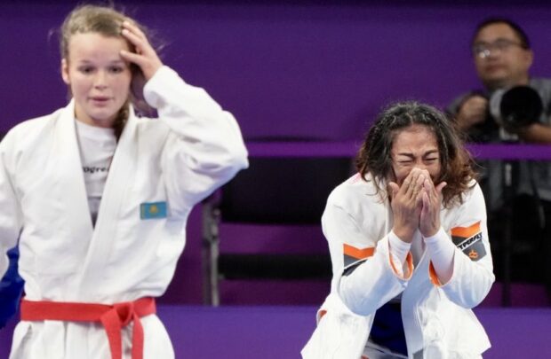 Annie Ramirez reacts after winning the gold in women's jiu-jitsu in the Asian Games. –