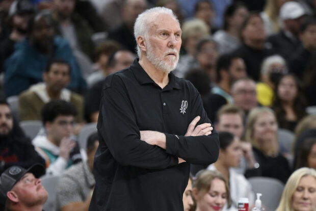 San Antonio Spurs head coach Gregg Popovich watches play during the first half of an NBA basketball game against the Los Angeles Clippers, Wednesday, Nov. 22, 2023, in San Antonio. Los Angeles won 109-102. 