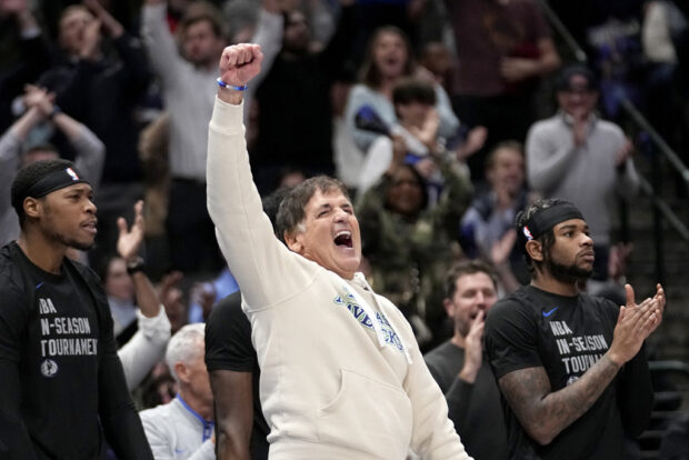 Dallas Mavericks team owner Mark Cuban celebrates late in the second half of an NBA basketball game against the Houston Rockets in Dallas, Tuesday, Nov. 28, 2023. 
