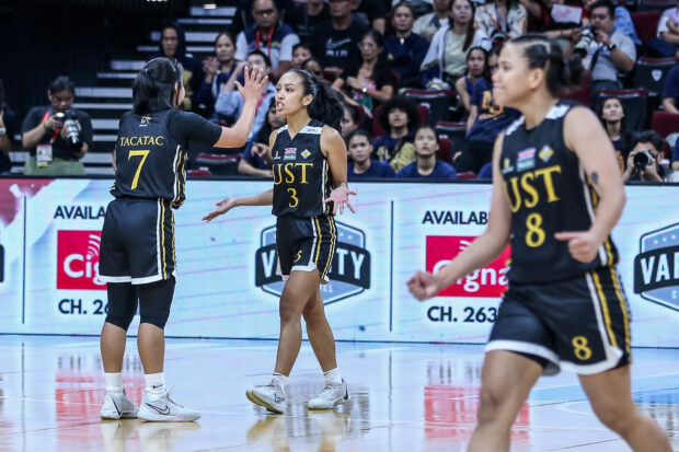 UST Growling Tigresses' Nikki Villasin comes through in clutch to end NU Lady Bulldogs' chokehold of the UAAP women's basketball competition. 