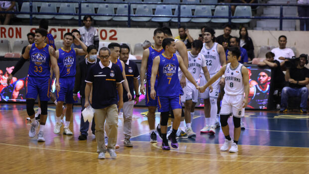 NLEX Road Warriors' Kevin Alas (No. 7) suffers another knee injury at the same venue.