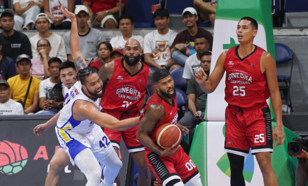 Tony Bishop Jr. (center) and Maverick Ahanmisi (with ball) have jelled well with the Gin Kings. —AUGUST DELA CRUZ