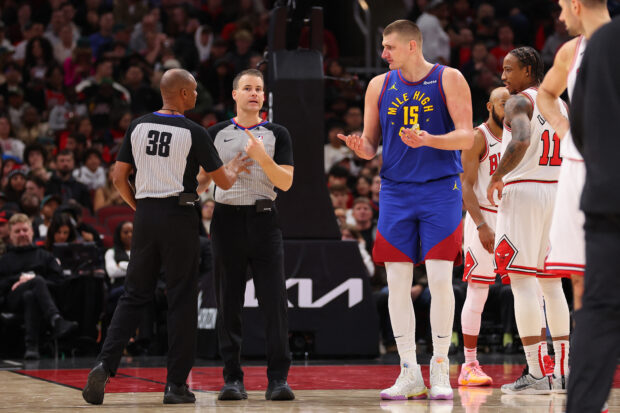 Nikola Jokic #15 of the Denver Nuggets reacts after being ejected from the game by referee Mousa Dagher #28 (not pictured) against the Chicago Bulls during the first half at the United Center on December 12, 2023 in Chicago, Illinois.