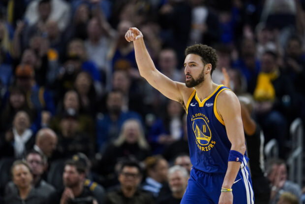 Golden State Warriors guard Klay Thompson gestures after scoring a 3-point basket against the Los Angeles Clippers during the second half of an NBA basketball game Thursday, Nov. 30, 2023, in San Francisco.