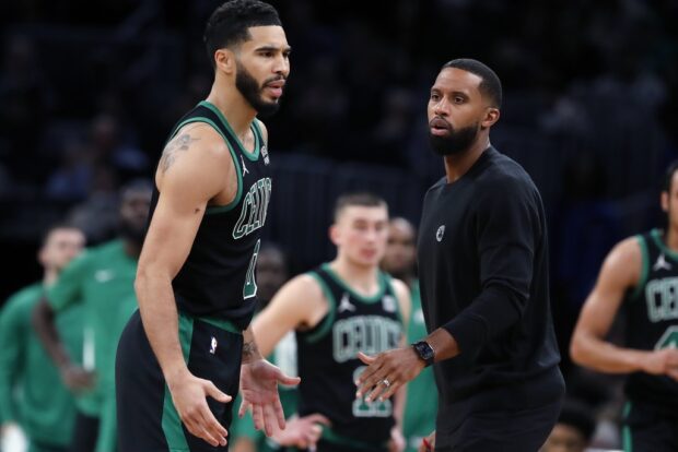 Boston Celtics' Jayson Tatum (0) protests a call just before being ejected during the second half of the team's NBA basketball game against the Philadelphia 76ers, Friday, Dec. 1, 2023, in Boston. 