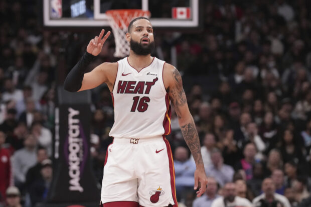 Miami Heat forward Caleb Martin reacts during his team's win over the Toronto Raptors in an NBA basketball game, Wednesday, Dec. 6, 2023 in Toronto.