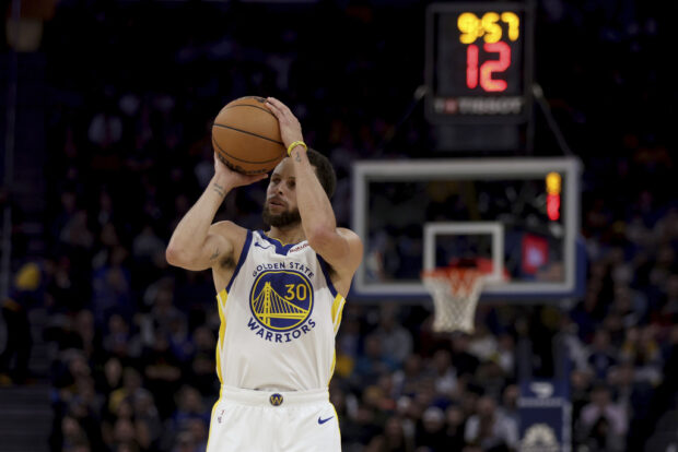 Golden State Warriors guard Stephen Curry (30) shoots during the second half of an NBA basketball game against the Portland Trail Blazers in San Francisco, Wednesday, Dec. 6, 2023. 