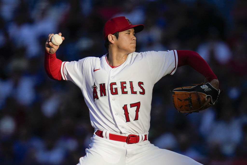 FILE - Los Angeles Angels starting pitcher Shohei Ohtani throws during a baseball game against the Los Angeles Dodgers in Anaheim, Calif., June 21, 2023.
