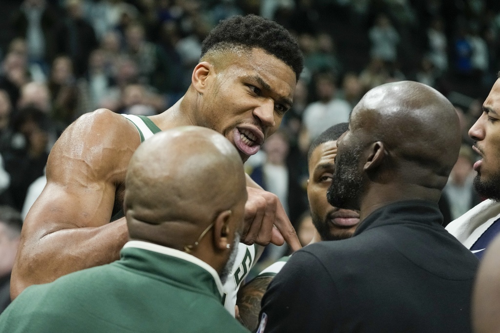 Milwaukee Bucks' Giannis Antetokounmpo argues with a Indiana Pacers coach after an NBA basketball game Wednesday, Dec. 13, 2023, in Milwaukee