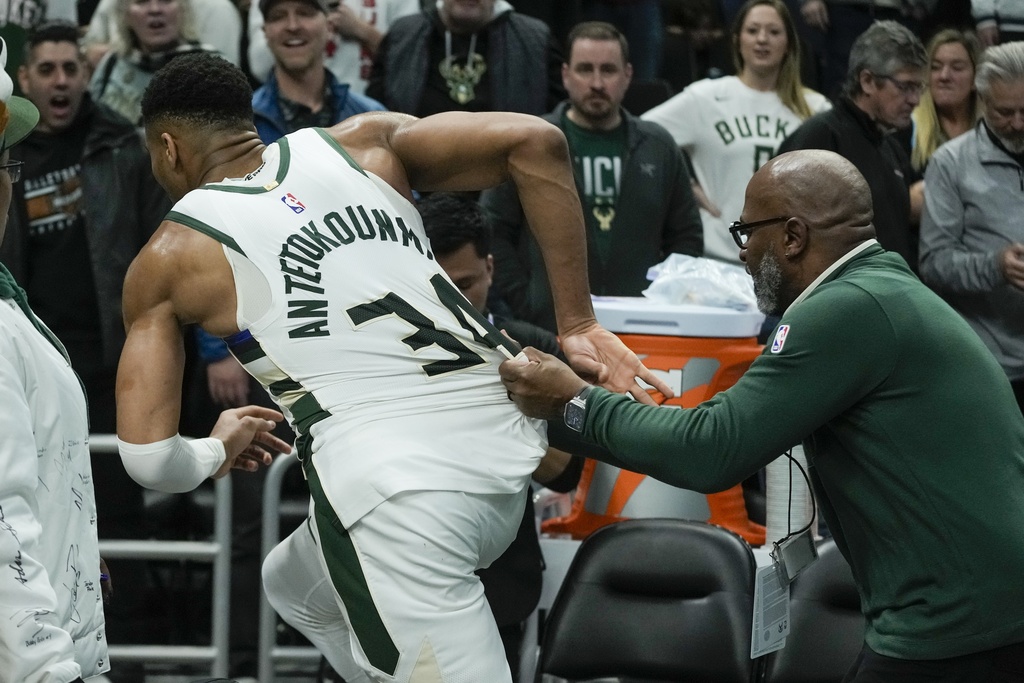 Giannis Antetokounmpo of the Milwaukee Bucks runs toward the Indiana Pacers locker room after an NBA basketball game on Wednesday, Dec. 13, 2023, in Milwaukee. 