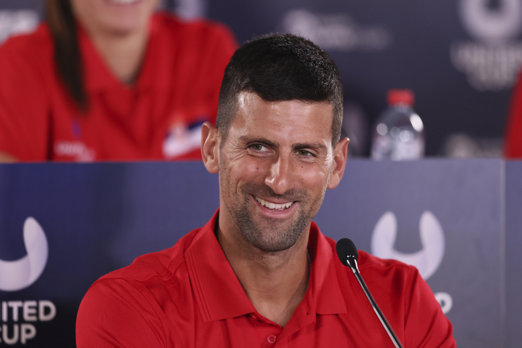 Novak Djokovic of Serbia speaks at a news conference during the United Cup tennis tournament in Perth, Australia, Saturday, Dec. 30, 2023. 